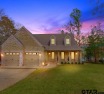 A waterfront stunner! On the highly desirable Middle Lake's west for sale in Hideaway Texas Smith County County on GolfHomes.com