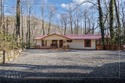 Enjoy a private 0.75-acre setting with the year-round sounds of for sale in Sapphire North Carolina Jackson County County on GolfHomes.com