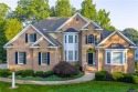 Set on a private golf course view lot, this timeless brick for sale in Williamsburg Virginia James City County County on GolfHomes.com