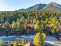 Located on the 13th hole of the Aspen Valley Golf course perfect for sale in Flagstaff Arizona Coconino County County on GolfHomes.com