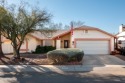 Move in ready.  LOTS of upgrades.  All new flooring throughout for sale in Tucson Arizona Pima County County on GolfHomes.com