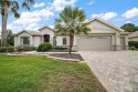 This pristine, expanded Hampton shows pride in ownership at for sale in Summerfield Florida Marion County County on GolfHomes.com