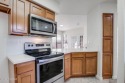 New Listing Alert!   Ground-level condo updated with a modern for sale in Tucson Arizona Pima County County on GolfHomes.com