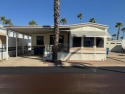 This 1989 Castle Park Model Home is in a beautiful 55+ age for sale in Tucson Arizona Pima County County on GolfHomes.com