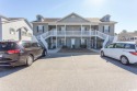 This immaculate top floor end unit boasts 3 bedrooms and 2 full for sale in Murrells Inlet South Carolina Horry County County on GolfHomes.com