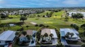 What a view! This immaculate 3 bedroom and 2 bathroom home for sale in Port Charlotte Florida Charlotte County County on GolfHomes.com