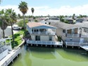 Rare find in amenity rich resort. Waterfront property with two for sale in Port Isabel Texas Cameron County County on GolfHomes.com