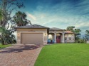 This exquisite home is perfectly situated at the entrance of the for sale in Cape Coral Florida Lee County County on GolfHomes.com