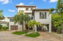 New IMPROVED price**A lifestyle of uncompromising luxury awaits for sale in Longboat Key Florida Sarasota County County on GolfHomes.com