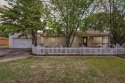Welcome to your next home! A charming ranch-style retreat for sale in Rockford Illinois Winnebago County County on GolfHomes.com