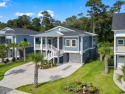 One of the most pristine and beautiful homes you'll ever lay for sale in North Myrtle Beach South Carolina Horry County County on GolfHomes.com