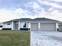 MOVE IN READY NOW! Come live in paradise with this beautiful for sale in Cape Coral Florida Lee County County on GolfHomes.com