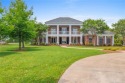Elegant golf course home situated on just under  3/4  of an acre for sale in Lake Charles Louisiana Calcasieu Parish County on GolfHomes.com