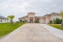 Welcome to your coastal haven! Situated in the South Padre Golf for sale in Laguna Vista Texas Cameron County County on GolfHomes.com