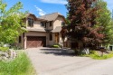 Surrounded by mature trees, this spacious and welcoming 4bd/3 for sale in Whitefish Montana Flathead County County on GolfHomes.com