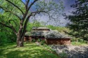 Tucked into the wooded hillside at the end of long ascending for sale in Galena Illinois Jo Daviess County County on GolfHomes.com
