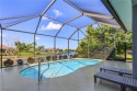 Waterfront Pool Home in the Heart of Cape Coral! Beautifully for sale in Cape Coral Florida Lee County County on GolfHomes.com