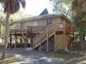 Cozy Edisto cottage situated on a nice wooded lot only a short for sale in Edisto Island South Carolina Colleton County County on GolfHomes.com