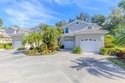 Rarely available end-unit condo with attached garage offering for sale in Naples Florida Collier County County on GolfHomes.com