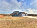 Nestled on a serene 1-acre lot in Blanchard, OK, this for sale in Blanchard Oklahoma Grady County County on GolfHomes.com