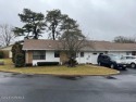 Welcome to this cozy 2 bedroom 1 1/2 bath home on a prime corner for sale in Manchester New Jersey Ocean County County on GolfHomes.com
