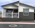 This exceptional manufactured home with upgraded features like for sale in Pahrump Nevada Nye County County on GolfHomes.com
