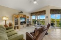 Rarely available top floor penthouse home with volume ceilings for sale in Estero Florida Lee County County on GolfHomes.com