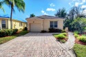 Nestled on a spectacular private tropically landscaped lot with for sale in Delray Beach Florida Palm Beach County County on GolfHomes.com