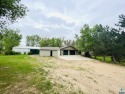 This Lennox acreage is truly unique! The home sits on 3.5 for sale in Lennox South Dakota Lincoln County County on GolfHomes.com