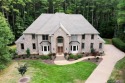 Step into timeless elegance with this one-owner, custom-built for sale in Providence Forge Virginia New Kent County County on GolfHomes.com
