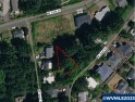 Opportunity is knocking! Buildable lot between Devil's Lake and for sale in Lincoln City Oregon Lincoln County County on GolfHomes.com