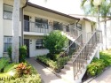 2 bedroom, 2 bath second floor unit with view of lake. Eat in for sale in Lake Worth Florida Palm Beach County County on GolfHomes.com