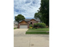 Exceptional 4-bedroom, 3.2-bath. Home in a park-like setting for sale in Clinton Township Michigan Macomb County County on GolfHomes.com