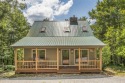 Make this adorable cabin your getaway to the Great Smoky for sale in Townsend Tennessee Blount County County on GolfHomes.com