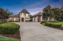 Nestled in the prestigious gated community of Le Triomphe Golf & for sale in Broussard Louisiana Lafayette Parish County on GolfHomes.com