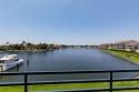 Incredible panoramic view in this Beautiful Waterfront unit for sale in Gulfport Florida Pinellas County County on GolfHomes.com