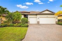 Live the Resort Lifestyle in Pelican Preserve! This gorgeous for sale in Fort Myers Florida Lee County County on GolfHomes.com