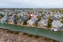 This beautifully remodeled 2-bedroom, 2-bath waterfront for sale in Port Isabel Texas Cameron County County on GolfHomes.com