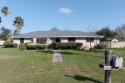 SeparateDriveway & entrance to the 400 sq ft guest house with a for sale in Port Isabel Texas Cameron County County on GolfHomes.com