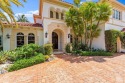 Welcome to 678 Hermitage Circle, an exceptional 5 bedroom 6 1/2 for sale in Palm Beach Gardens Florida Palm Beach County County on GolfHomes.com