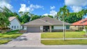 Welcome to your dream home! This updated 4-bedroom, 2.5-bathroom for sale in Boca Raton Florida Palm Beach County County on GolfHomes.com