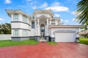 MAGNIFICENT CUSTOM 2-STORY MEDITERRANEAN ESTATE 5 / 4 house with for sale in Hollywood Florida Broward County County on GolfHomes.com