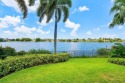 This exceptional lakeside estate blends sophistication, comfort for sale in Boca Raton Florida Palm Beach County County on GolfHomes.com