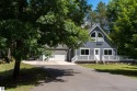 Welcome to life at the LAKE!  This .56 acre home with lake for sale in Weidman Michigan Isabella County County on GolfHomes.com