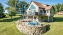 Discover the perfect lake view retreat at Lake Carroll.  Home for sale in Lake Carroll Illinois Carroll County County on GolfHomes.com