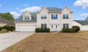 Welcome to this beautifully maintained 4-bedroom, 3-bathroom for sale in Myrtle Beach South Carolina Horry County County on GolfHomes.com