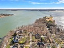 Do not miss out on this incredible lakefront peninsula lot for sale in Mooresville North Carolina Iredell County County on GolfHomes.com