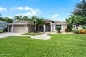 This exquisite three-bedroom, two-bathroom pool home, complete for sale in Port Orange Florida Volusia County County on GolfHomes.com