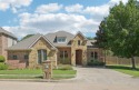 This BEAUTY is nestled on a spacious third-acre lot with a for sale in Rockwall Texas Rockwall County County on GolfHomes.com