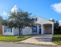 This custom Hawthorne model home features dual primary en suites for sale in Titusville Florida Brevard County County on GolfHomes.com